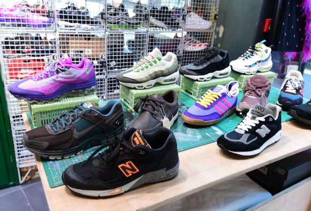 This photo shows trainers in different colours on display in All Over The Shop in the Metquarter.