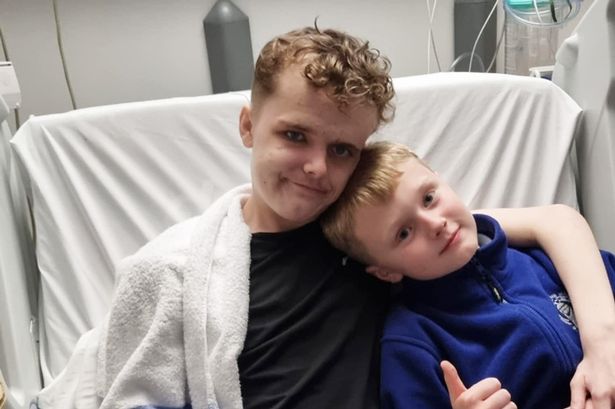 Rhys Russell (left) pictured in hospital with his little brother Jayden 