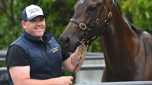 Trainer Ben Smith poses with In Her Time in 2017.
