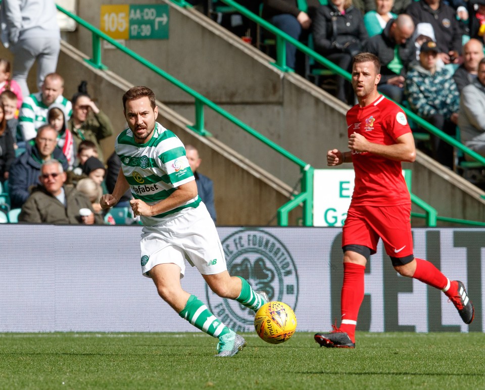 Martin Compston playing soccer.