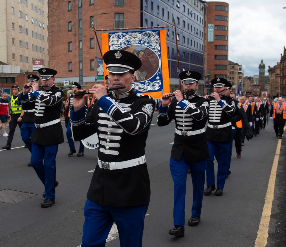 Orange order marching band playing flutes in Glasgow.