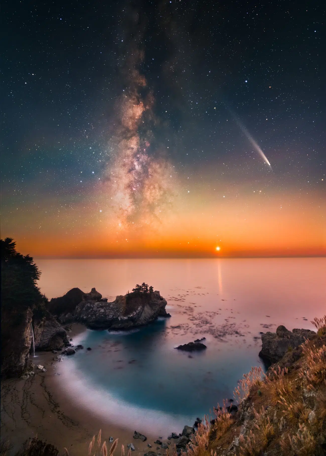 Milky Way and Comet Tsuchinshan–ATLAS over McWay Falls in Big Sur, California
