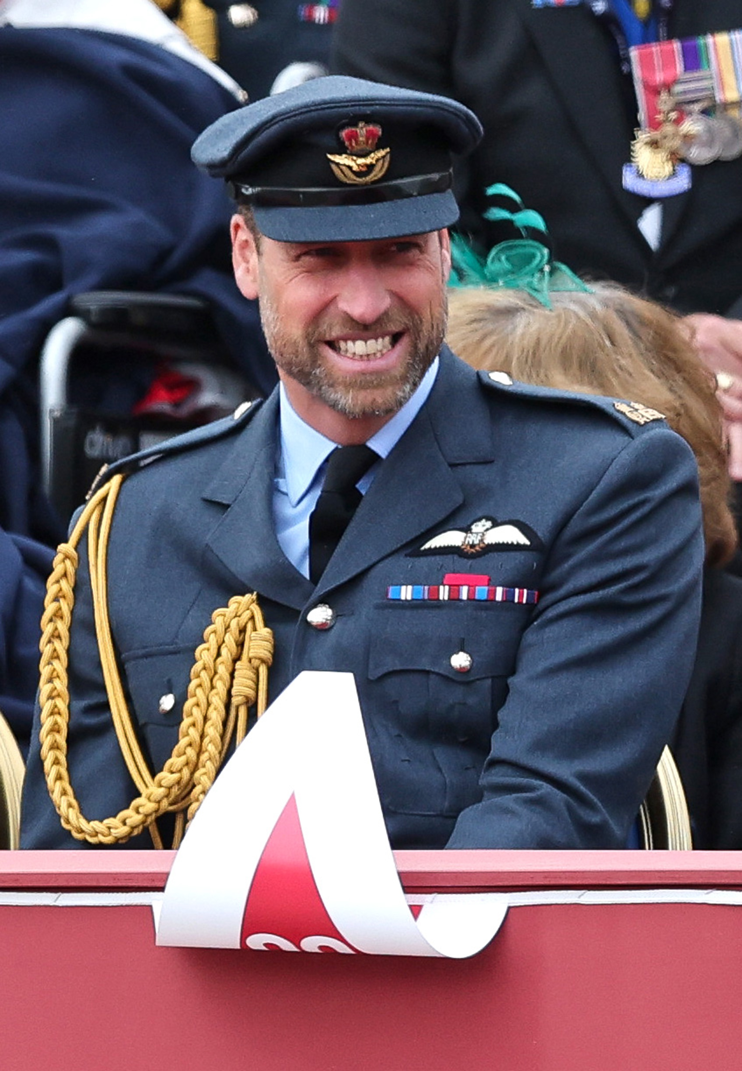 Prince William watches the procession.