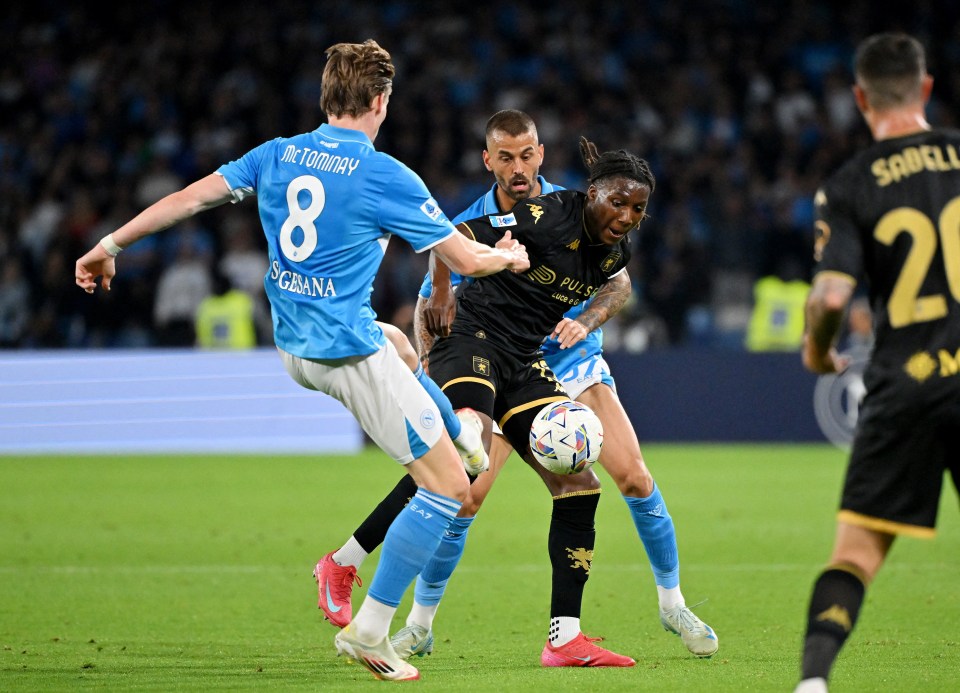Scott McTominay of Napoli and Leonardo Spinazzola in action during a soccer match.