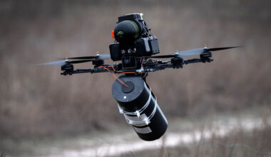 A Ukrainian made FPV fibre optic drone flies during a demonstration at a military market