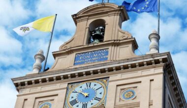 The Vatican flag (left) flies alongside the European Union flag atop the Quirinale presidential palace in Rome, as the Pope meets with the Italian president, Nov. 14, 2013.