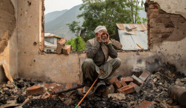 A Kashmiri resident reacts in his house damaged by cross-border shelling in Salamabad village, near the Line of Control Uri.
