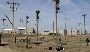 Students train working on power lines at Mitchell Tech, the only South Dakota college to offer a wind energy major.