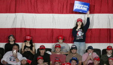 Young supporters of US President Donald Trump listen during a campaign rally.