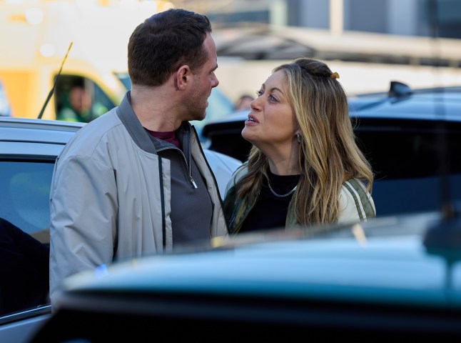 Lou talking to Mick in a carpark in Coronation Street