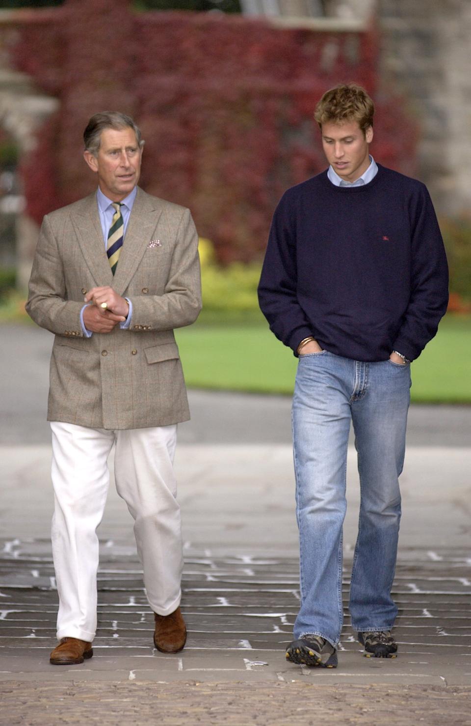 King Charles walking next to Prince William at St Andrews