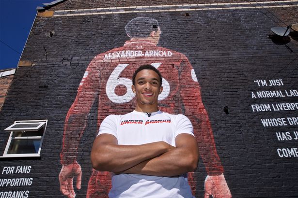 Trent Alexander-Arnold in front the mural on Sybil Road.