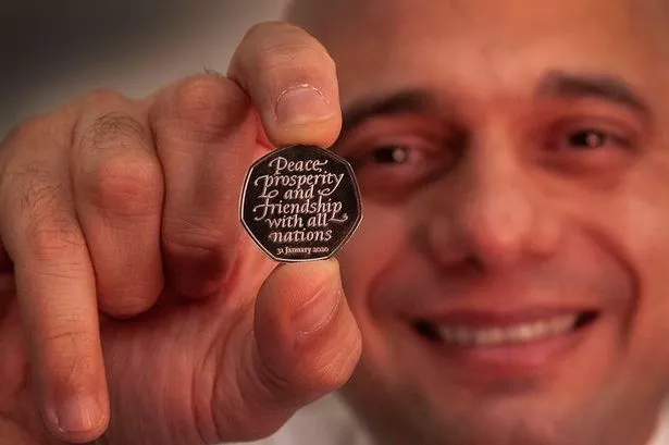 Sajid Javid holds the Brexit 50p