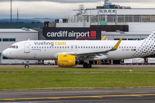 A commercial aircraft on a runway outside Cardiff airport 