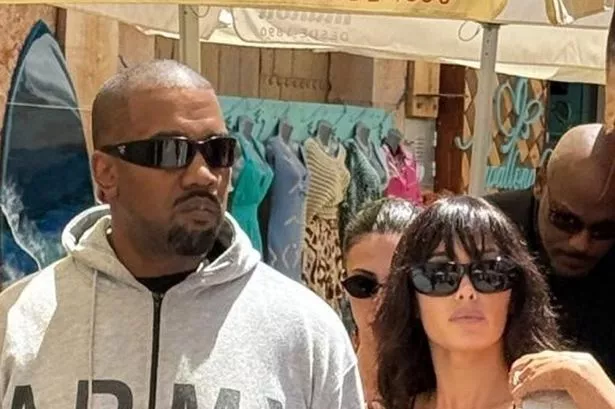 Kanye and Bianca walk around the markets in Mallorca