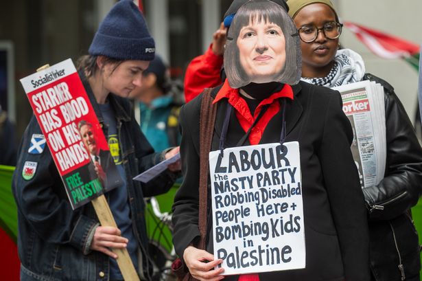 Campaigners gather to demand the Labour government scrap plans for cuts to disability benefits