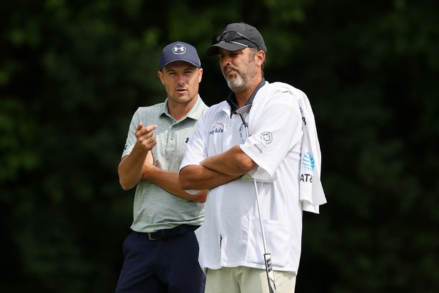 DUBLIN, OHIO - MAY 29: Jordan Spieth of the United States meet with caddie Michael Greller on the second green during the first round of the Memorial Tournament presented by Workday 2025 at Muirfield Village Golf Club on May 29, 2025 in Dublin, Ohio. (Photo by Michael Reaves/Getty Images)