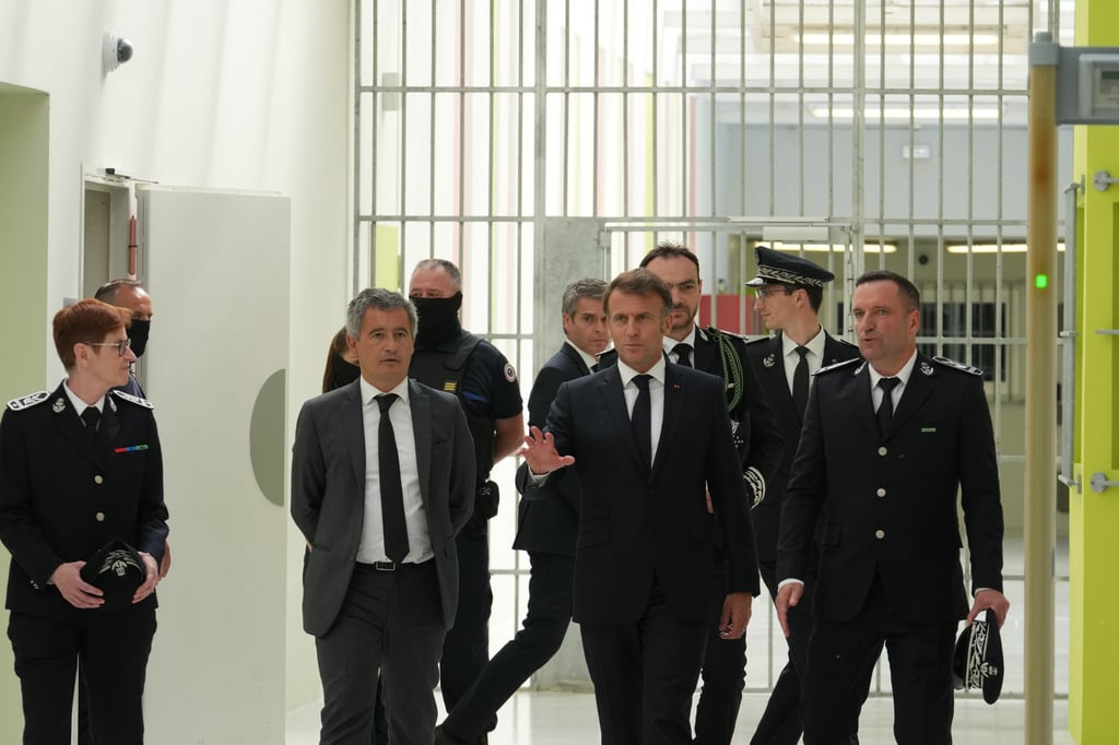 France’s President Emmanuel Macron (centre) and France’s Justice minister Gerald Darmanin (centre-left) visit the Vendin-le-Vieil prison, in northern France on Wednesday. Photo: EPA-EFE