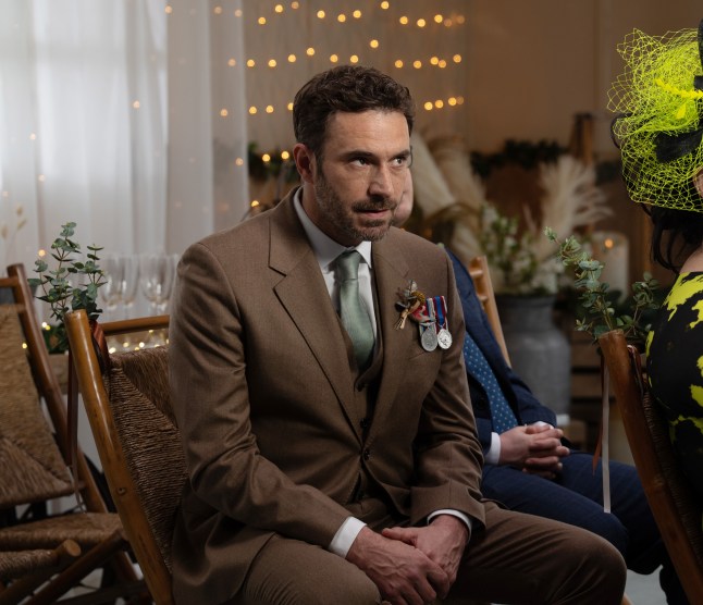John looks nervous as he sits in his wedding suit on Emmerdale