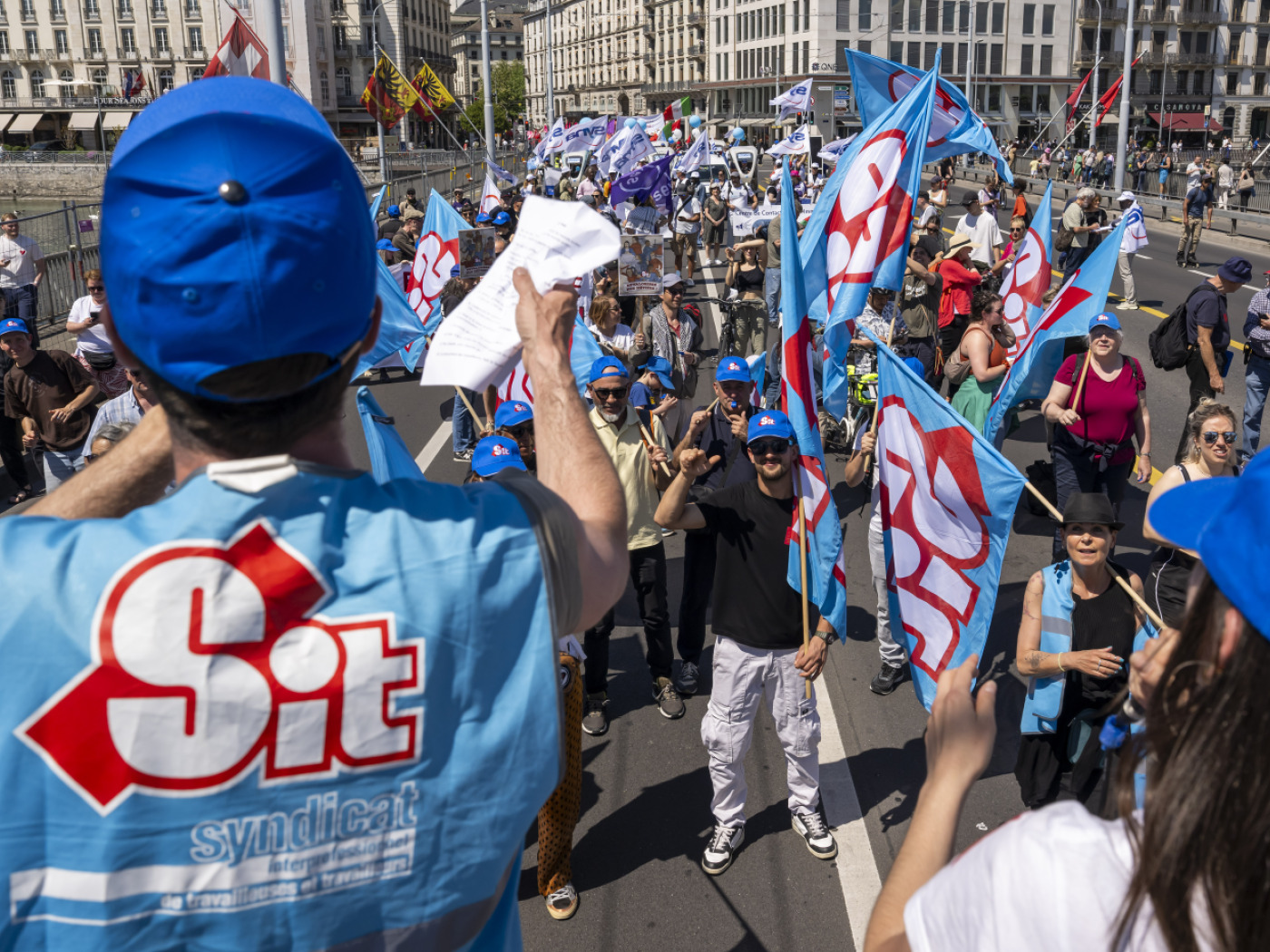 Nearly 2,500 people march through the streets of Geneva