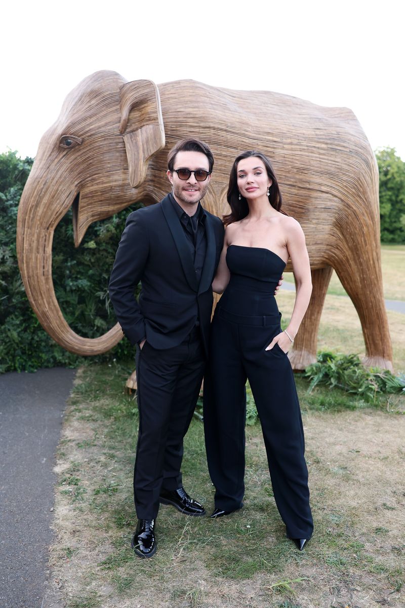 LONDON, ENGLAND - MAY 13: Ed Westwick and Amy Jackson attend The Elephant Family Evening of Art and Conservation at Kew Gardens on May 13, 2025 in London, England. Established by Queen Camillaâs brother Mark Shand in 2002, The Elephant Family works in partnership with conservation experts on the ground to tackle the challenges facing Asiaâs wildlife and the communities that live alongside it. (Photo by Chris Jackson/Getty Images)