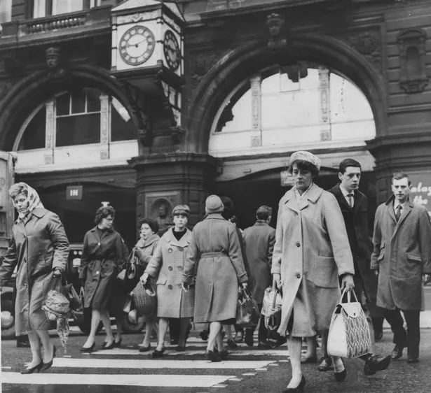 Rail passengers outside Exchange Station in Tithebarn Street in Liverpool, June 1964