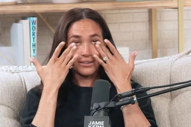 Close up of a teary Meghan Markle on the Jamie Kern Lima Podcast