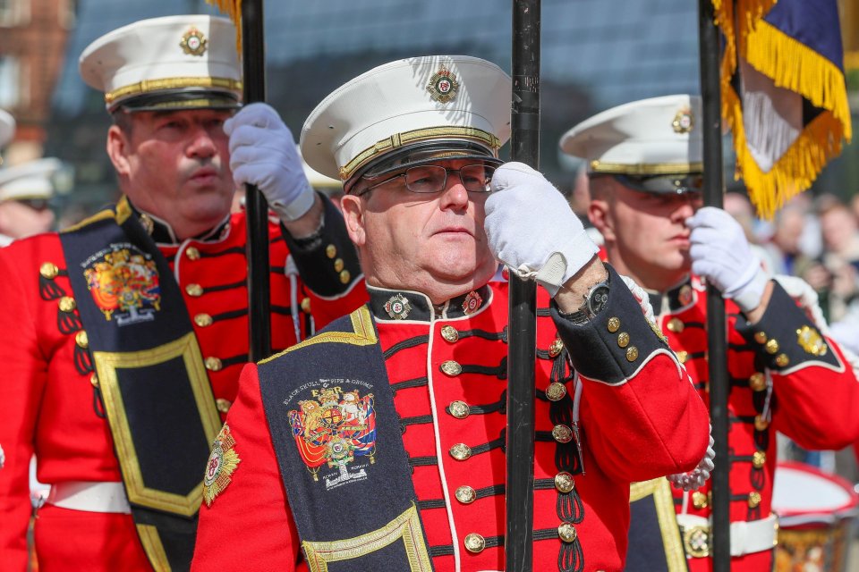 Members of the Grand Lodge of Scotland Orange Order in a parade.