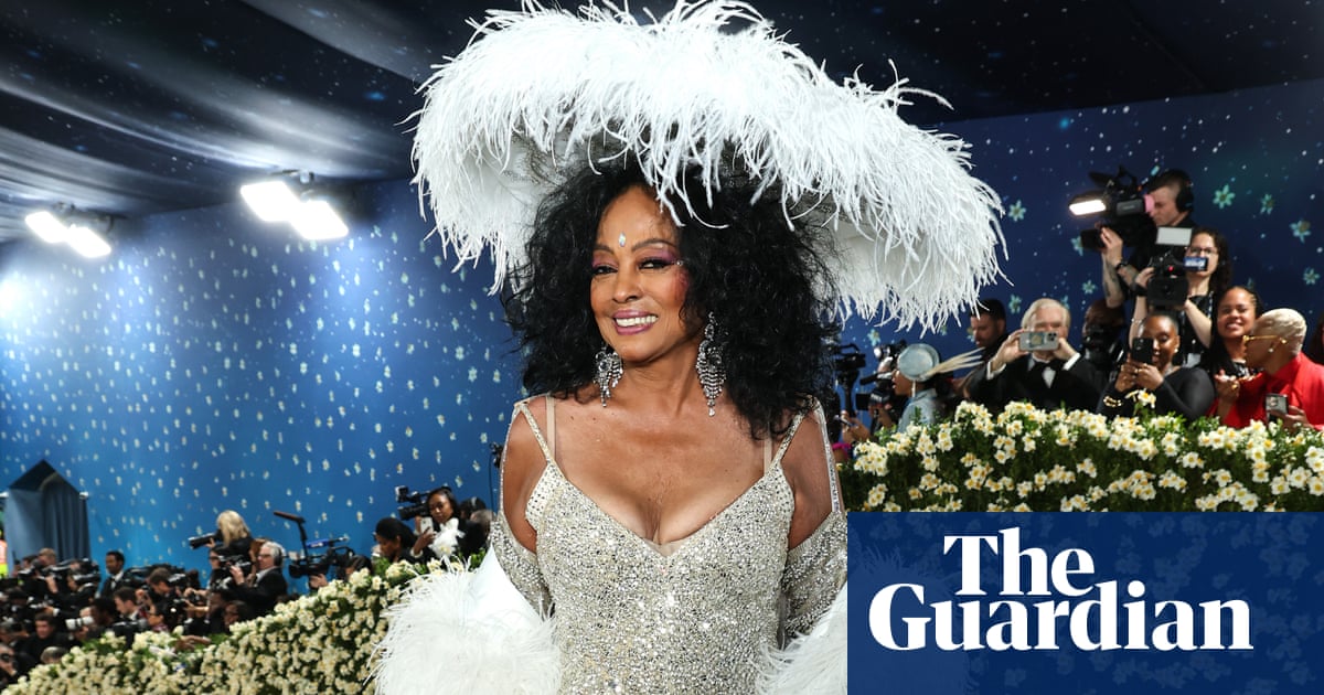 Met Gala 2025 red carpet: pinstripes, capes and pouring rain – in pictures - The Guardian