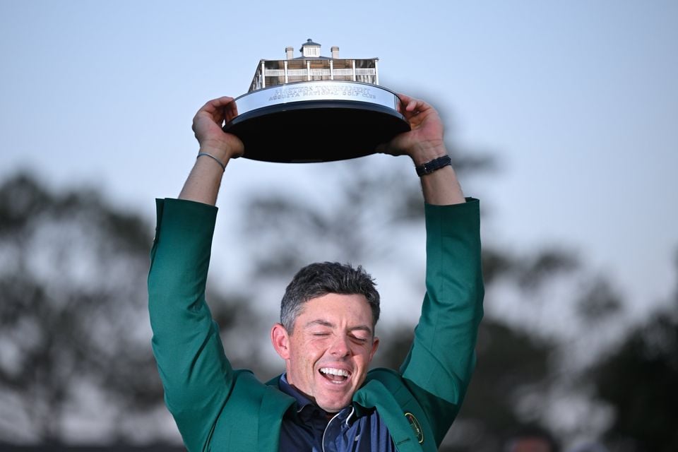 Rory McIlroy lifts the Masters trophy