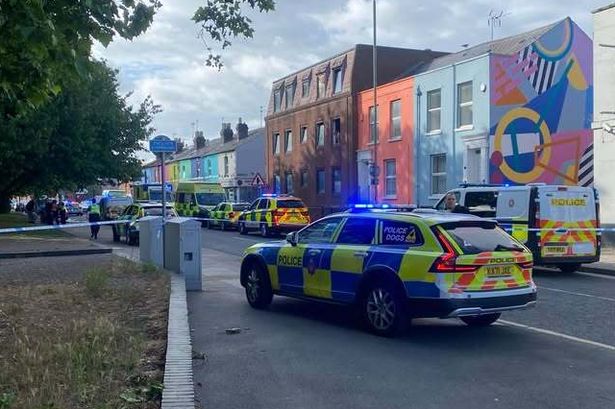 A police cordon is in place on Station Road, Gloucester