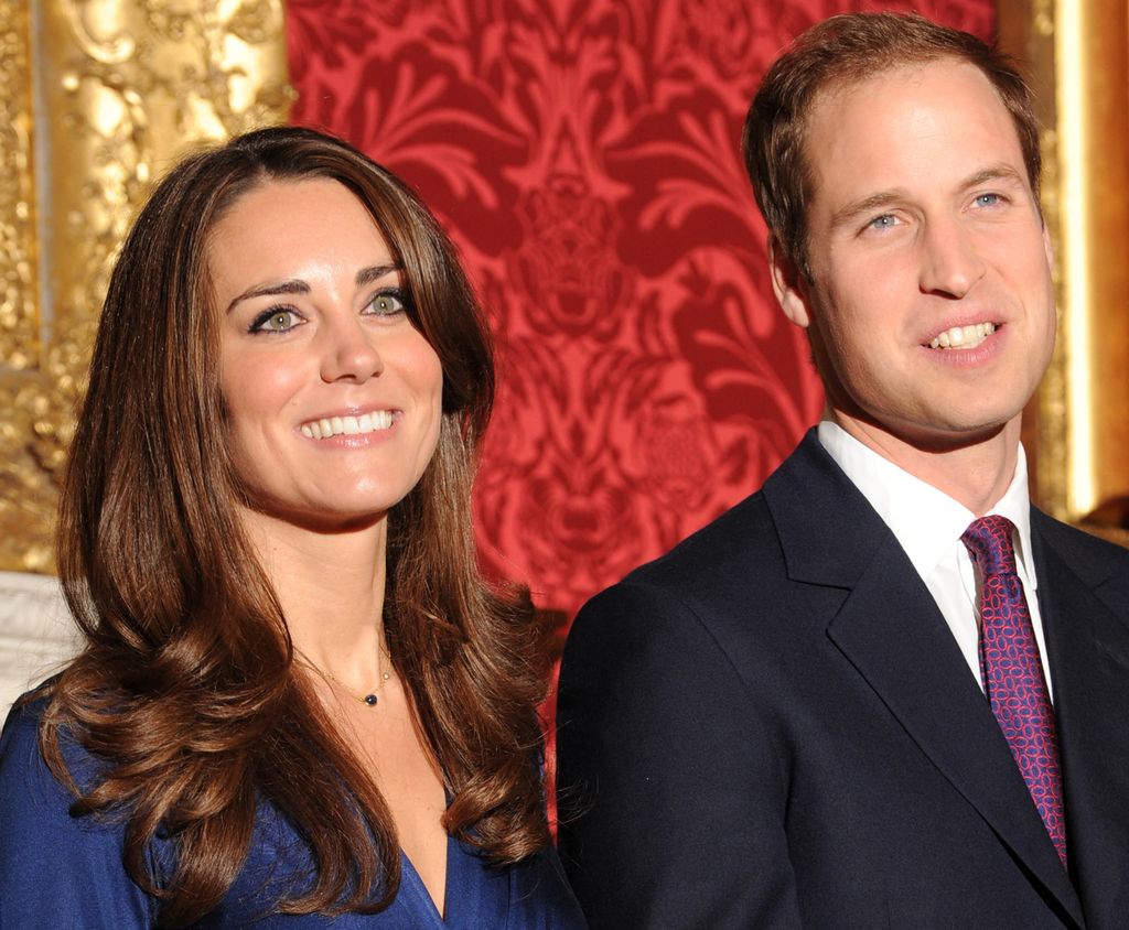 Kate smiling beside william