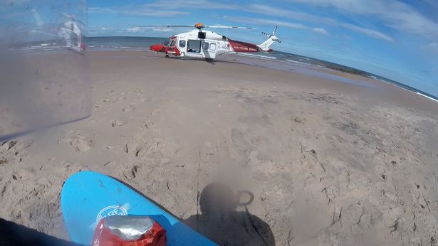 A Coastguard helicopter at the scene.