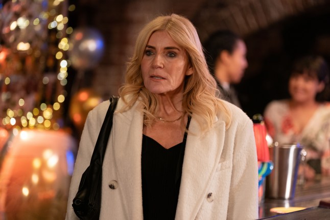 Cindy stands in Harry's Barn in EastEnders