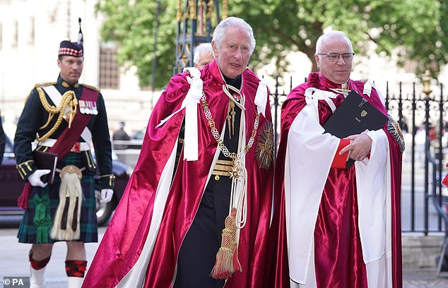 During his final appearance as the Great Master, before William (not pictured) takes over for his father on Friday, Charles donned his full regalia for the ceremony that honours officers of the Armed Services and civil servants.