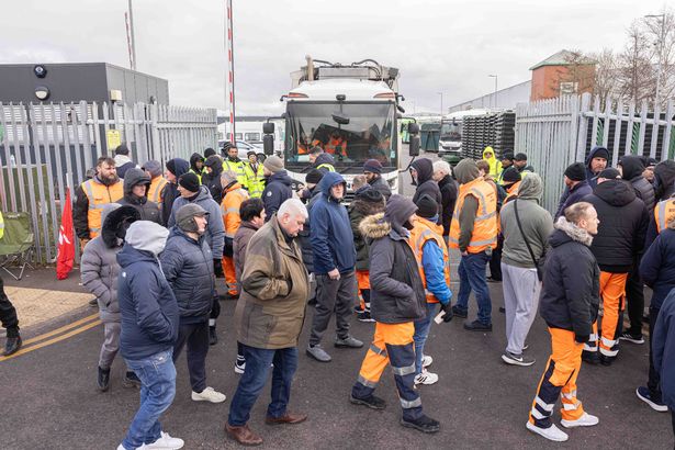 Striking bin men walked in front of bin lorries leaving Birmingham City Council's depot in Redfern Road in Tyseley