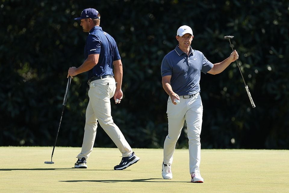 Bryson DeChambeau and Rory McIlroy react during the final round of the 2025 Masters Tournament at Augusta National Golf Club. (Photo by Richard Heathcote/Getty Images)