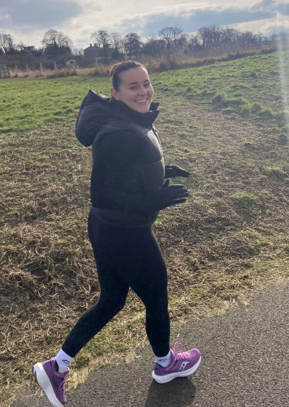 Woman smiling while running