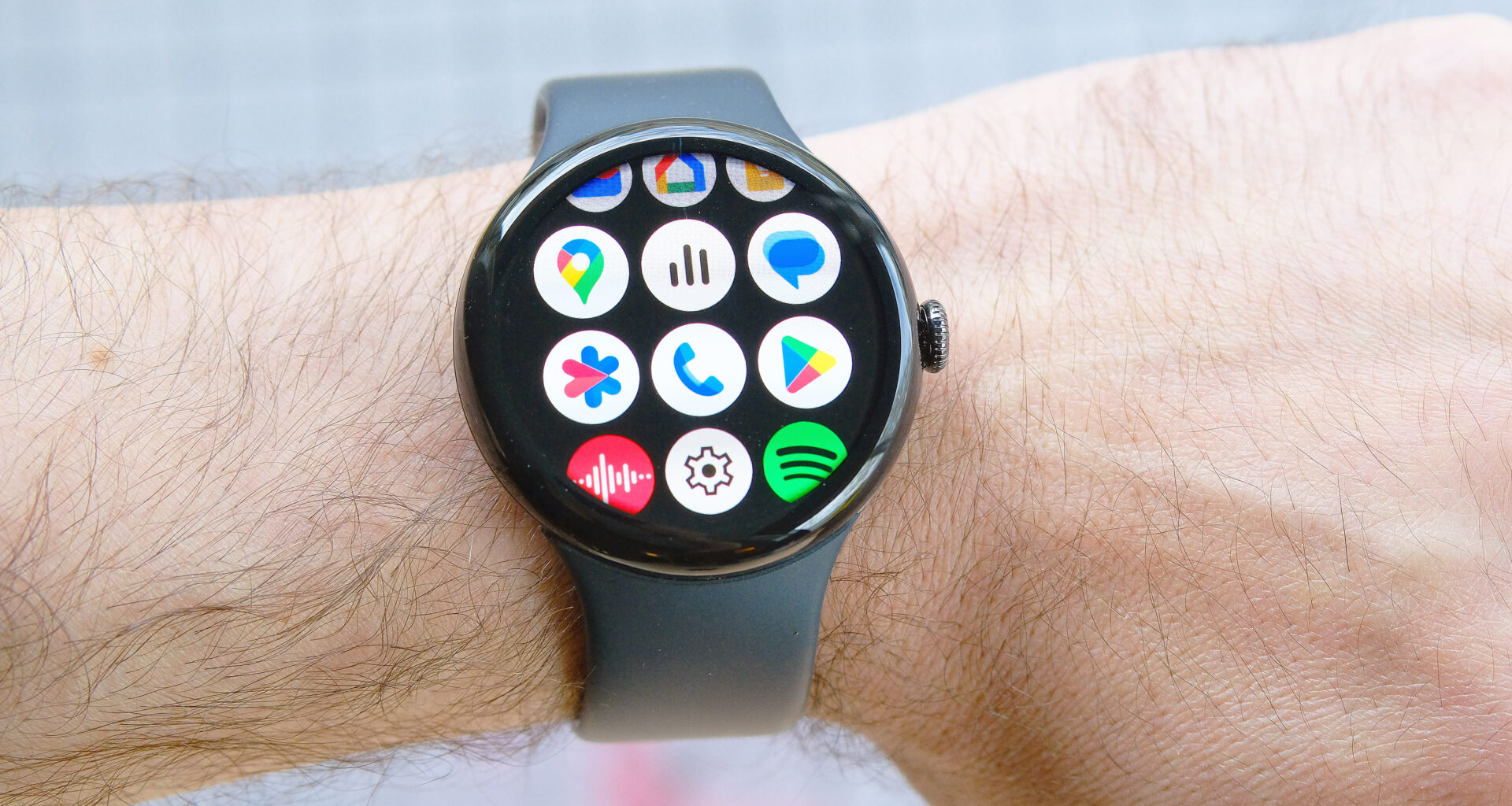 A close-up of the Google Pixel 9 showing the process for enabling Loss of Pulse Detection on the Pixel Watch 3
