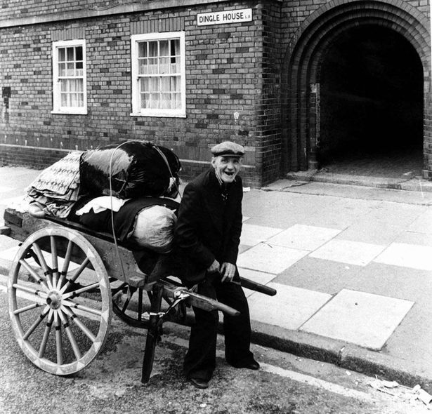 Rag and bone man outside Dingle House, Liverpool. Year unknown