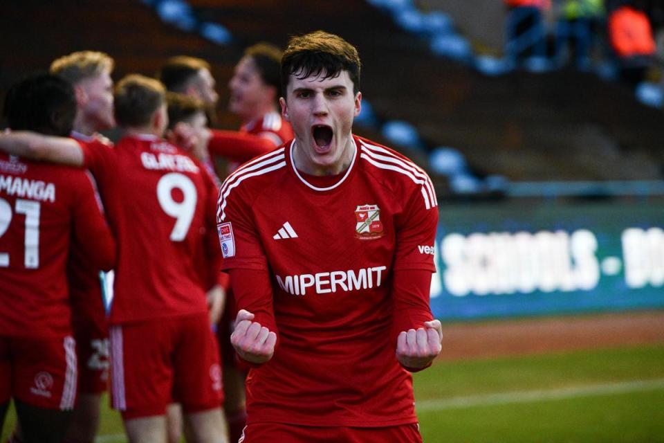 Cotterill celebrates Swindon scoring at Carlisle <i>(Image: Callum Knowles)</i>
