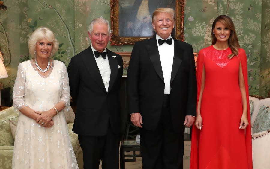 US President Donald Trump (2R), US First Lady Melania Trump (R), Britain’s Prince Charles, Prince of Wales (2L), and his wife, Britain’s Camilla, Duchess of Cornwall, pose for a photograph ahead of a dinner at Winfield House on June 4, 2019. (Photo by Chris Jackson / POOL / AFP)