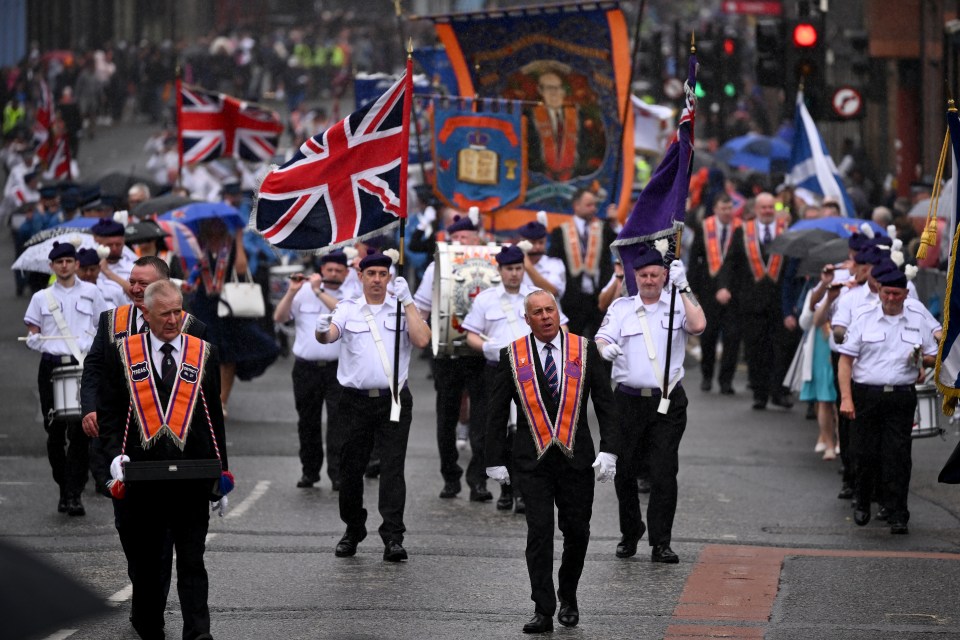 Members of the Orange Order participating in a parade.