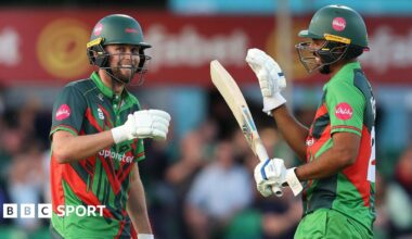 Leicestershire batter Sol Budinger (left) celebrates his 50 with Rishi Patel