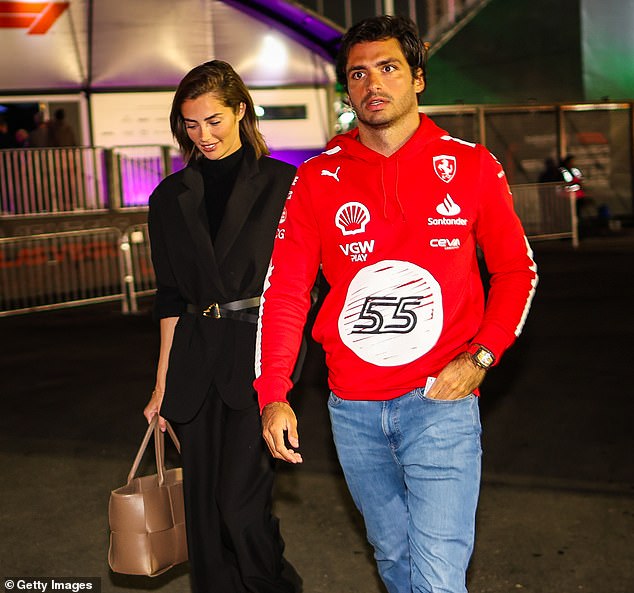 Carlos Sainz pictured in 2023 with his girlfriend Rebecca Donaldson while he was still at Ferrari