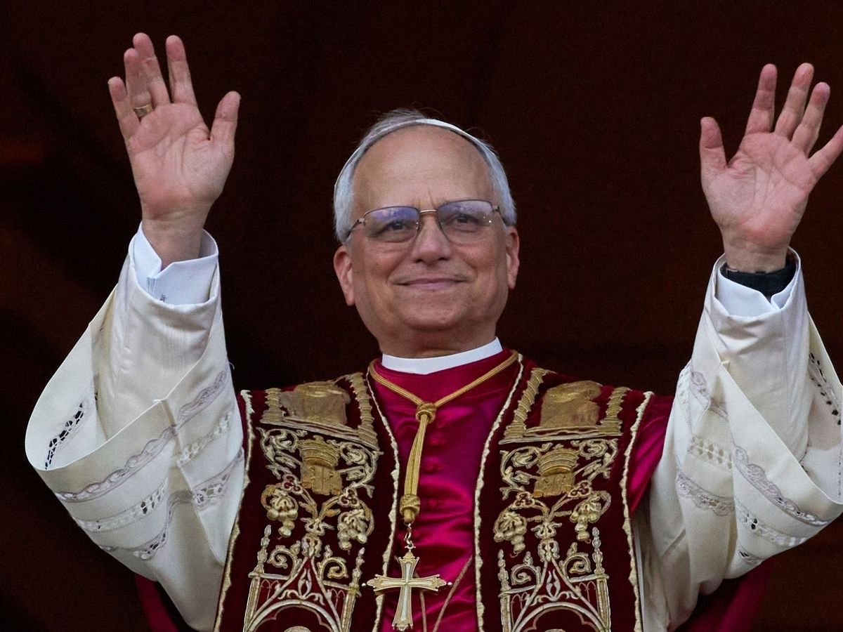Father Peter Weatherby (holding shovel) said