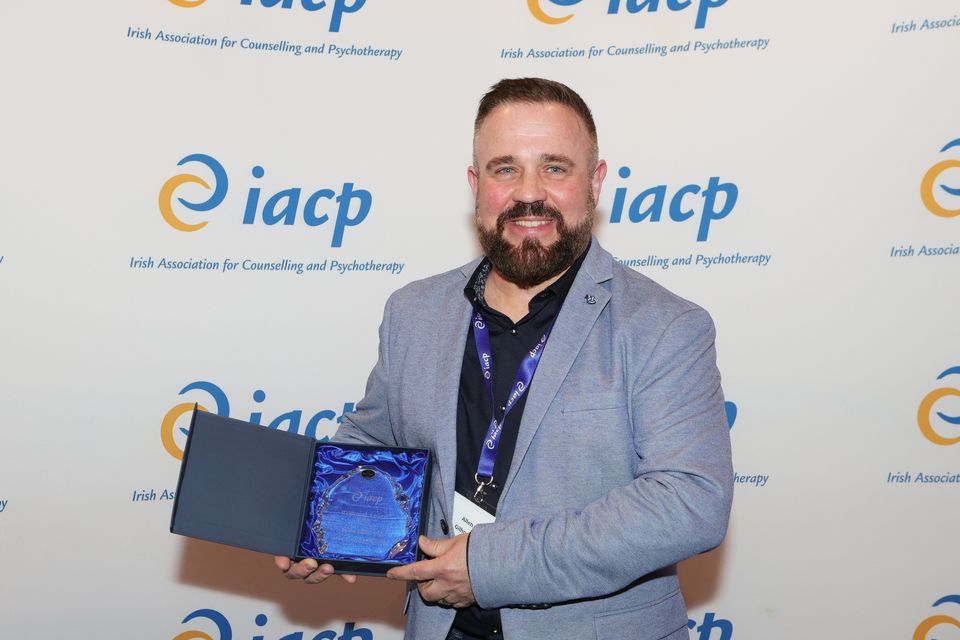 Allen Gilhooly with his award