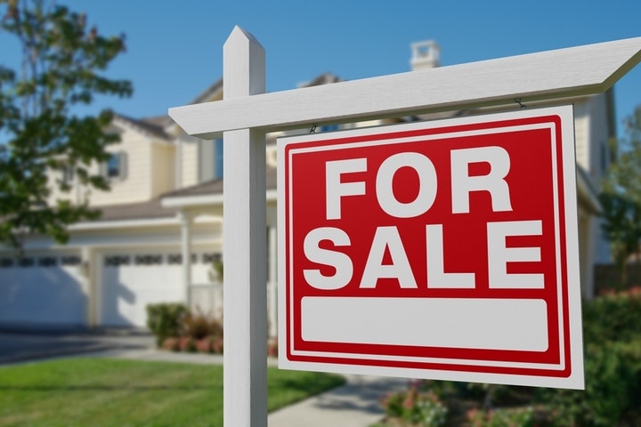 For Sale Signs Emerge Everywhere As One Of The City's Employment Pillars Teeters