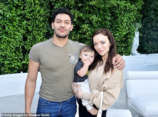 The pair were pictured with their son Titan, now six, in 2019 in LA