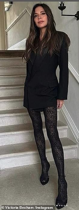 Victoria opted for a mini black blazer dress and lacy black tights as she put on a very leggy display